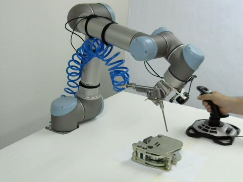 universal-robots-zacobria-grit-blasting-shot-peening-robot-teach-by-joystick